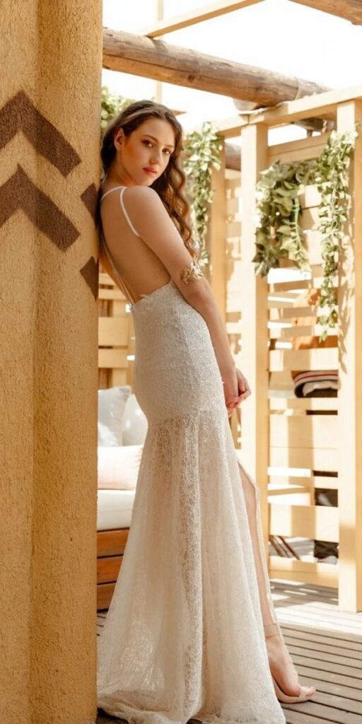 Charm and playfulness are infused into these boho beach wedding dresses with the addition of lace.