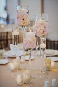 Ideas For Floating Candle Centerpieces For Wedding Including Candles And Rose Petals That Are Both Modern And Romantic. 200x300 