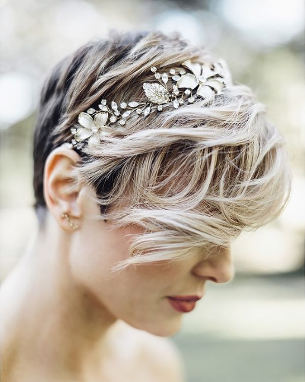 If you don't want your hair up or covered by a veil a headpiece is a great alternative for short wedding hairstyles.
