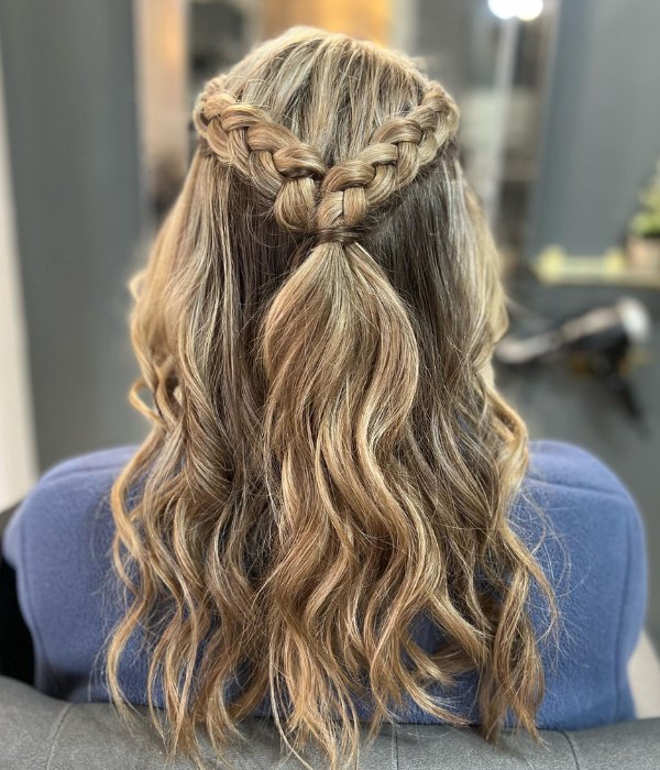 If you're a bohemian bride consider a half-up half-down hairstyle with braids to achieve a free-spirited and romantic look