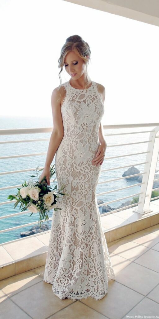 The boho chic lace wedding dress is a perfect fit for the beach wedding.