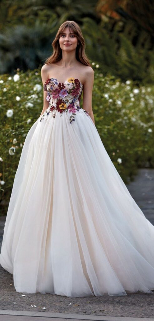 The ideal traditional bridal gown with a modern twist is this lovely princess style embroidered Mexican dress.