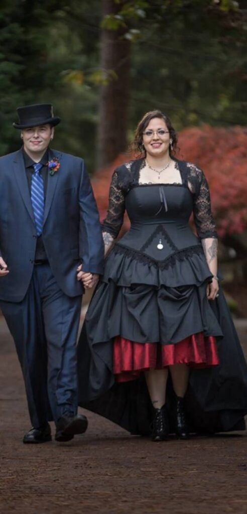 There's nothing more beautiful than this plus size red and black gothic wedding dress from the vampire world.