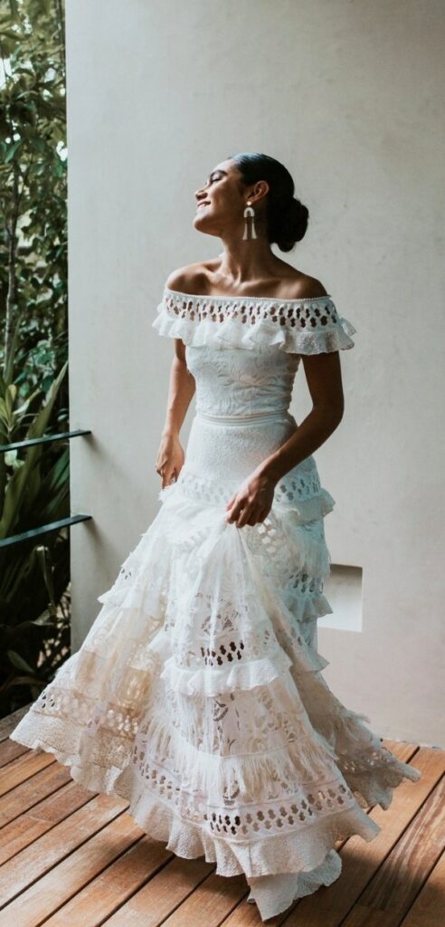 This Mexican dress is the perfect blend of sophistication and cultural charm making it an ideal choice for an intimate wedding celebration
