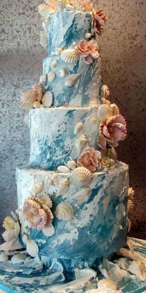 This cake with its blue hues and gorgeous sea shells is a wonderful option if you're looking for beach wedding cake ideas.