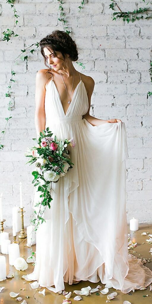 This dress fits perfectly has some type of flow and is the perfect choice for a casual beach wedding.
