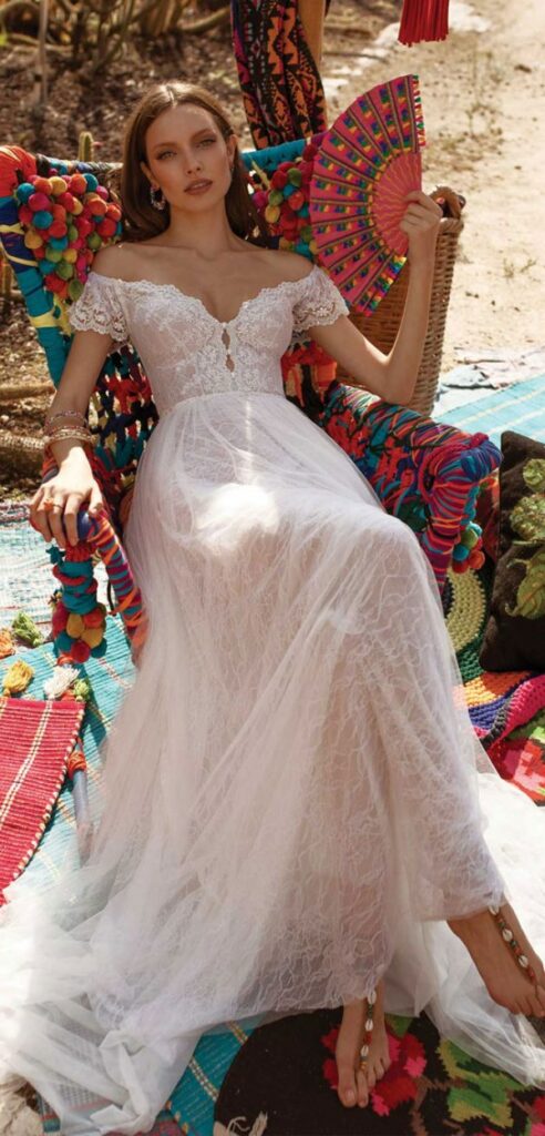 This embroidered lace Mexican wedding gown is perfect if you're the type of boho bride who wants something delicate and girly.