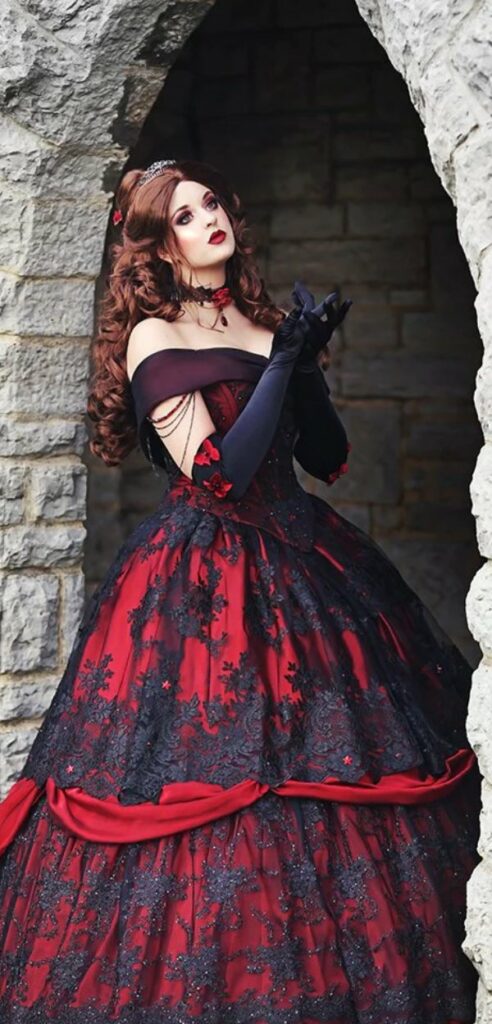 This gothic wedding dress in colors of red and black would be perfect for a Halloween wedding.
