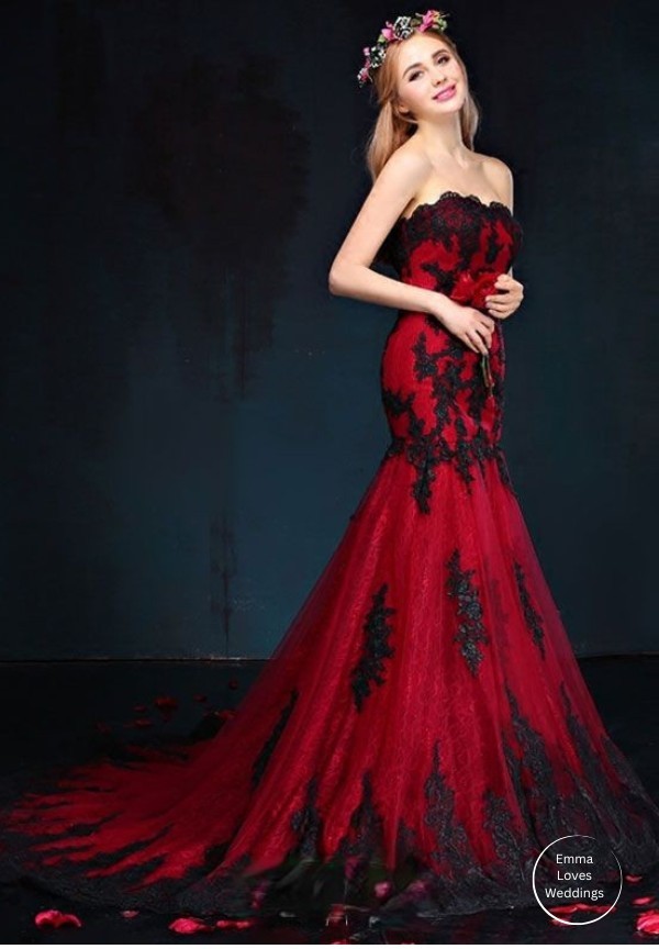 This magnificent and enticing red and black lace mermaid strapless bridal gown is sure to turn heads as you make your grand entrance on your wedding day.