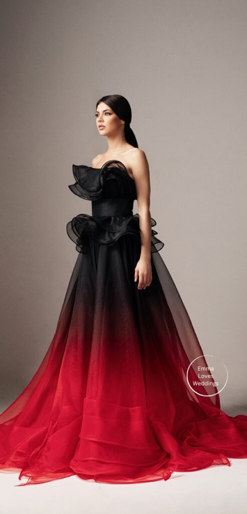 This ruffled red and black ombre wedding dress exudes a mystical air of romance and majesty making it ideal for an outstanding bridal look.