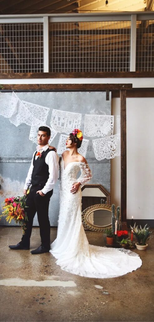 This traditional Mexican modern wedding dress for bride and groom showcases their culture with vibrant colors and intricate embroidery.