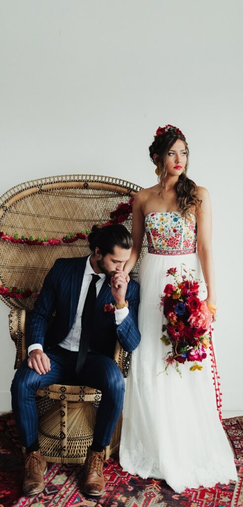This vivid and delicately embroidered folk inspired wedding gown celebrates love and Mexico's rich heritage.
