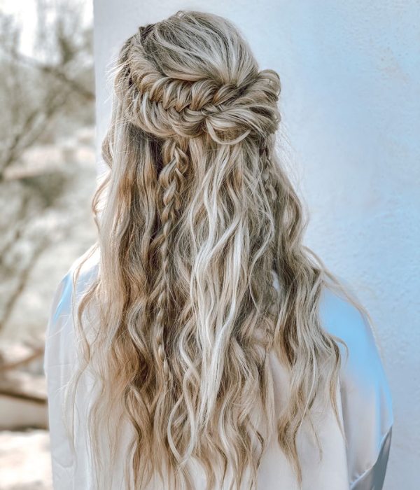 Wedding hairstyle with half up half down braids in the boho style
