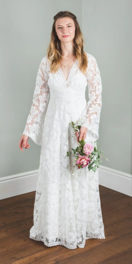 With off white cotton lace fabric this long V neck lace plus size beach wedding dress is stunning.