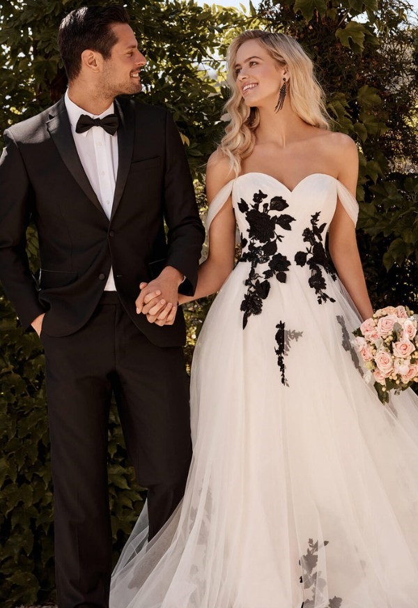 You'll feel like a fairy as you float down the aisle in this ethereal black and white ballgown.