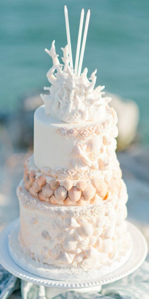 Your beach wedding cake will look stunning with delicate shells as an accent.