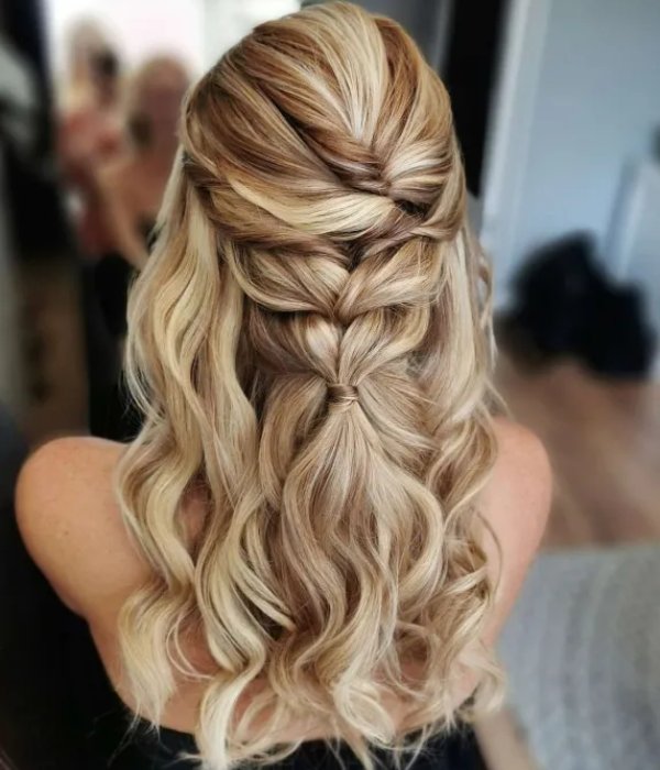Your wedding hair will have more texture and volume if you braided it half up and half down.