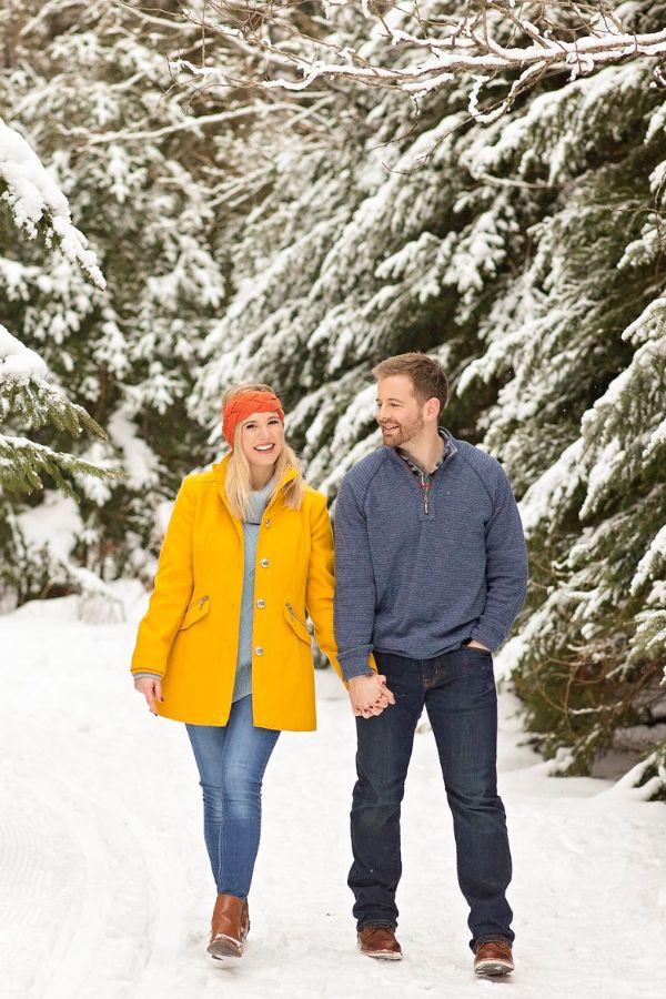 A picturesque winter wonderland setting for an engagement photo shoot