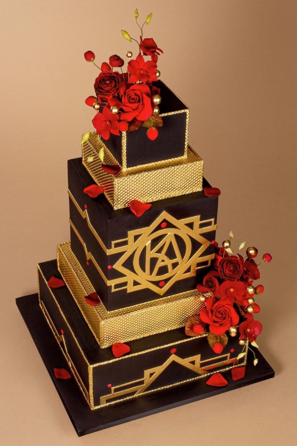 A striking red and black cake with a splash of dazzling gold adds glamor and richness to your wedding day