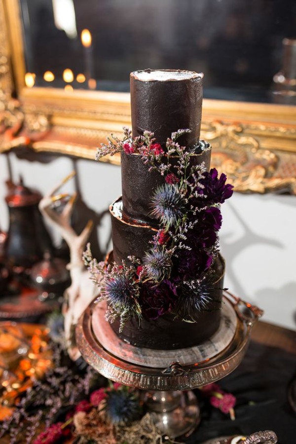 Add some edge to your big day with a dark and moody black wedding cake
