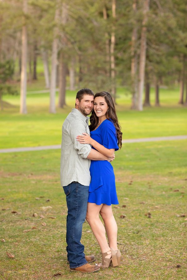 An elegant blue outfit will highlight your love in your engagement photos