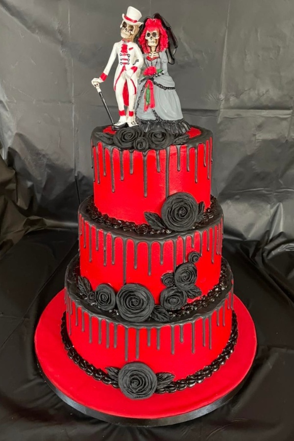 Celebrate the halloween season with a deliciously tasty red and black wedding cake