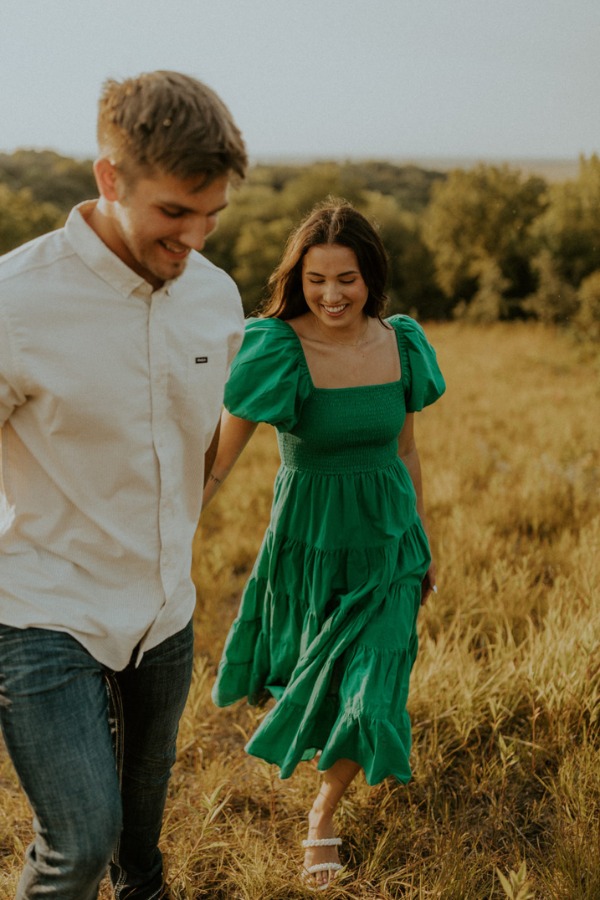 Choose a colorful outfit for your engagement photo to make a statement Consider wearing sandals with a flowy sundress in a striking color like green