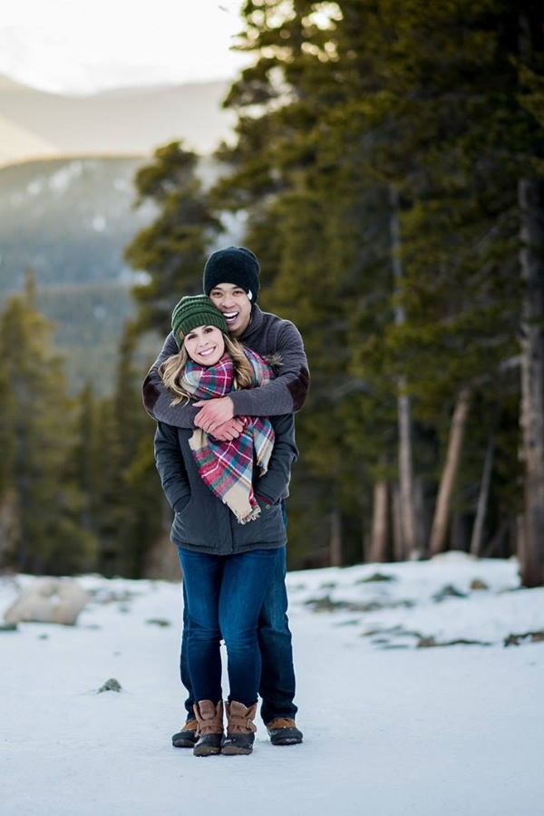 Dress warmly for your engagement photos as a way to celebrate your love this winter