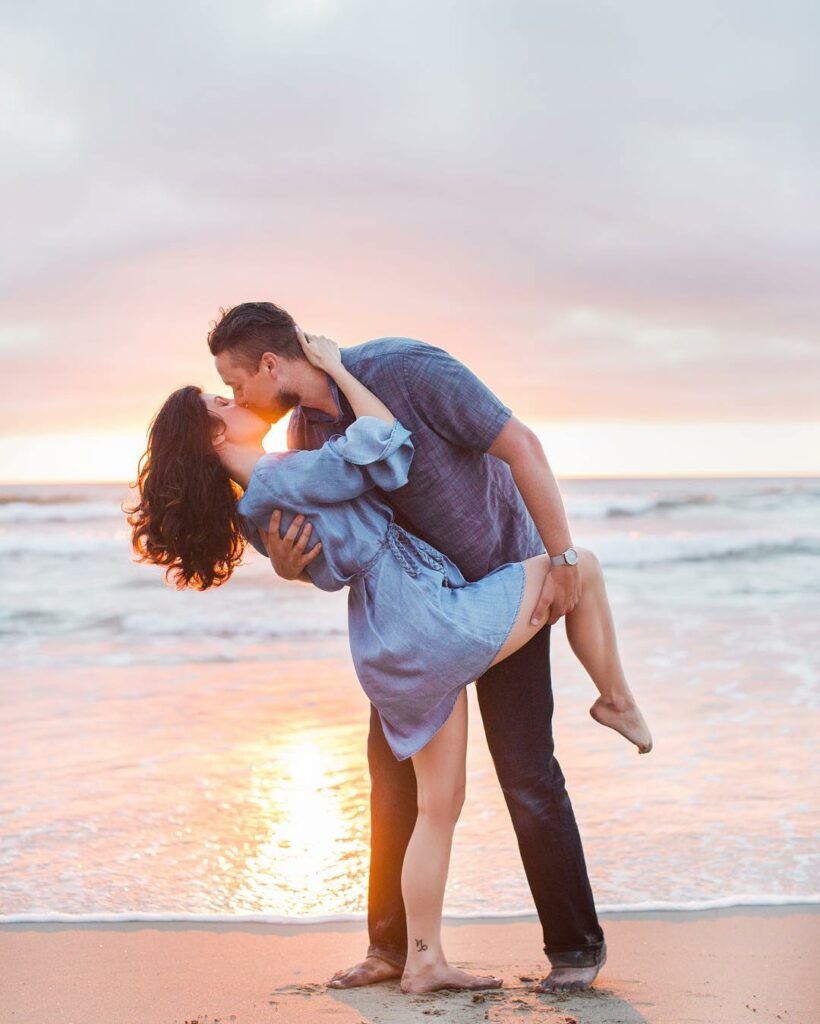 Engagement photo on a beach in the gorgeous sunlight