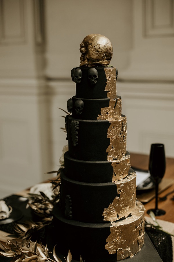High tier gothic black cake with gold leaf