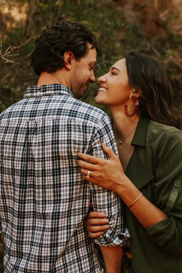 Posing as a pair while flaunting the ring is a beautiful idea for an engagement photo shoot