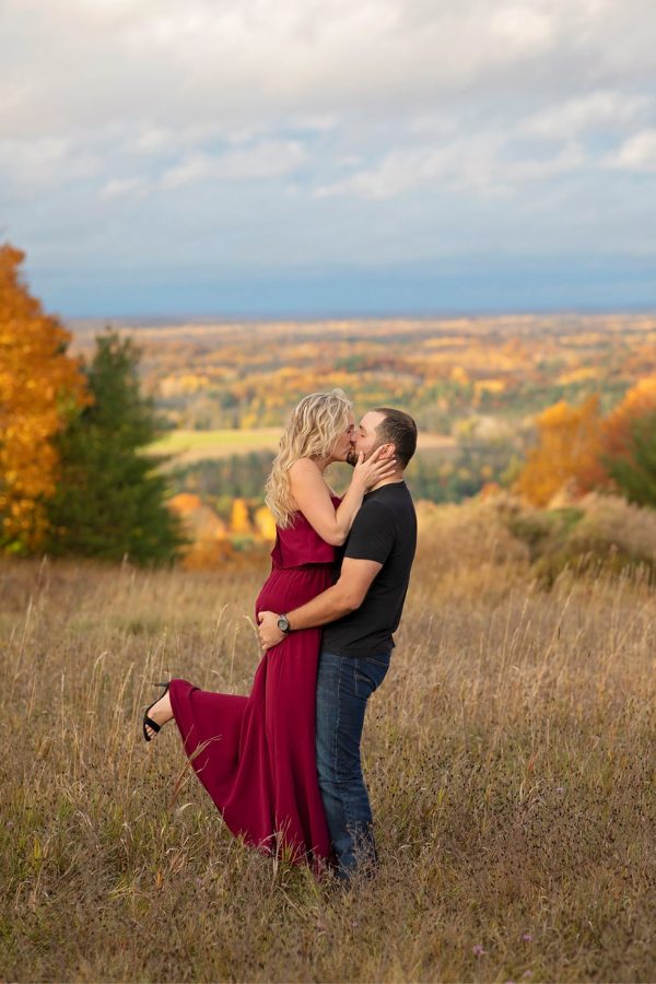 This wonderful engagement photo dress and lovely backdrop captures the beginning of the love tale in the crisp autumn air
