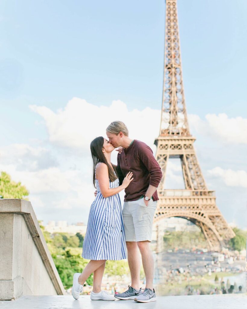 To take their engagement photos in front of the Eiffel Tower this couple got all dolled up