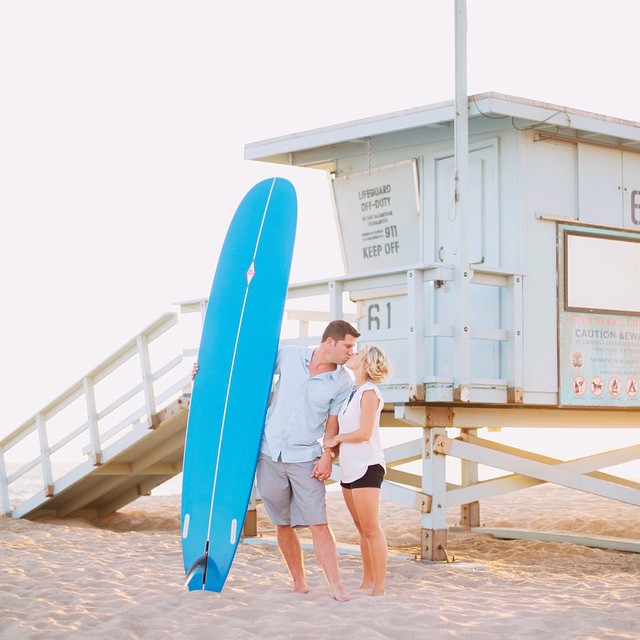 Using a beach and sand in their photo is really a fun whimsical touch and we love it