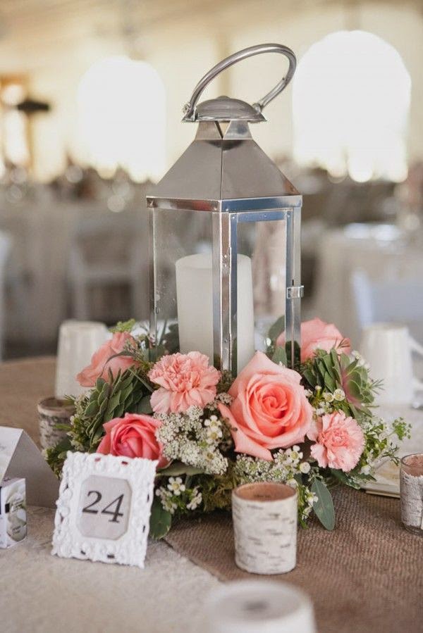 Wedding table centerpiece silver lantern with pink flowers and numbers