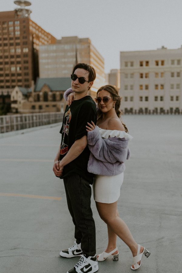 You can jazz up your engagement photo outfits by wearing sunglasses