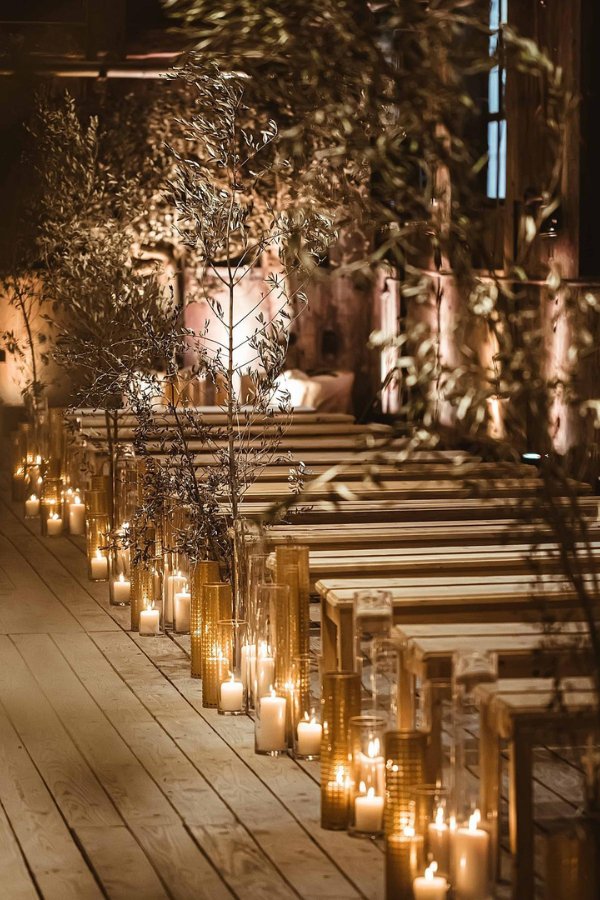 olive branches and candle light rustic wedding aisle decorations