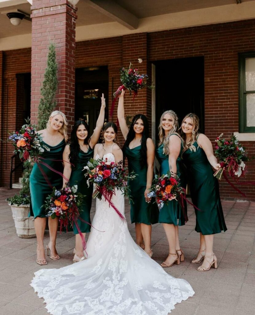 revelry emerald green satin midi bridesmsid dresses