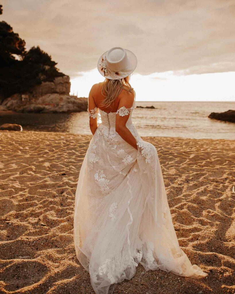 beach boho off the shoulder wedding dress with hat