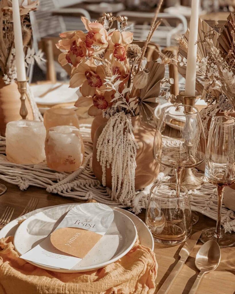 boho floral and candles table setting