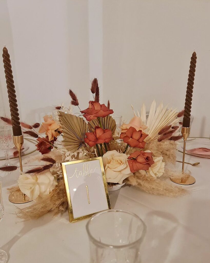 boho rust color wedding decorations with table number