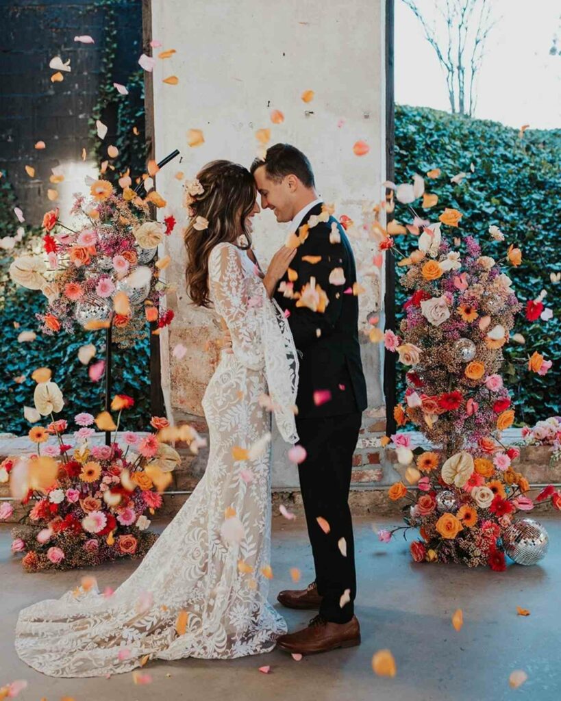 boho theme wedding dress with colorful floral arrangements