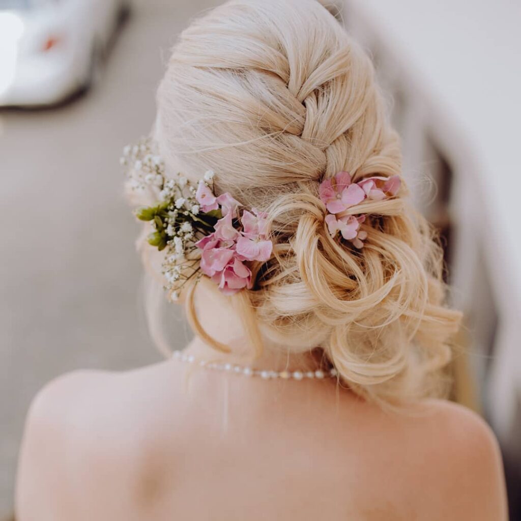 braided boho flower adorn wedding hairstyle