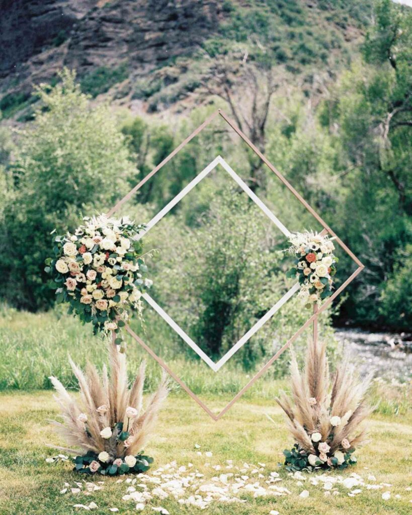 diamond boho wedding arch décor with pampas gras