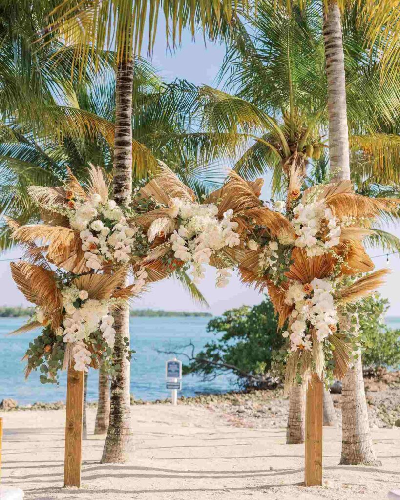 dried palms and pampas grass bohemian beach wedding arch ideas