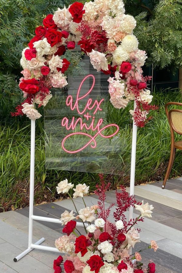 red and white blooms acrylic wedding seating chart