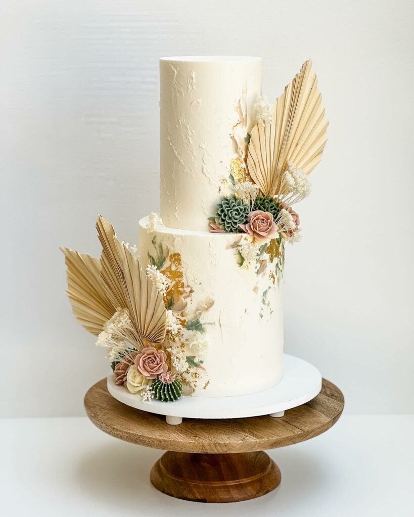 two tier boho theme dried palm leave wedding cake ideas