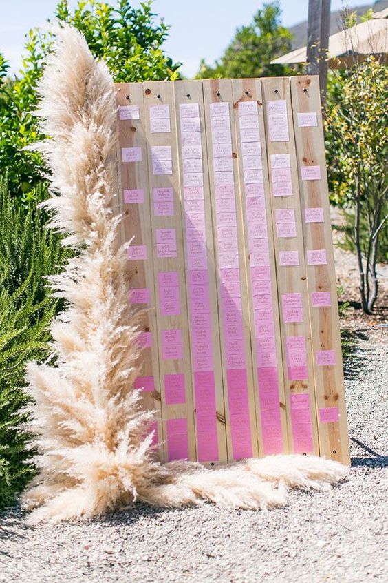 wooden wedding board with bohemian pampas grass decorations
