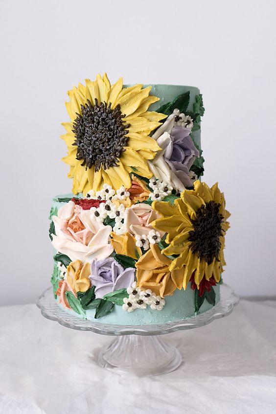 Palette knife sculpted wedding cake with sunflowers