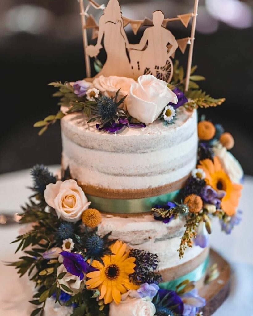boho wedding sunflower and fresh flowers wedding cake